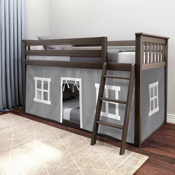 there is a bunk bed with a ladder to the bottom and a loft bed above it