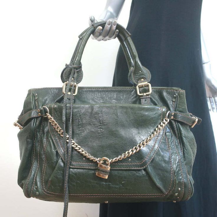 Chloe Large Paddington Capsule Tote Dark Green Leather Shoulder Bag Pre-Loved. Good Condition. No Major Flaws, A Few Small Scratches In Leather. Wear On Corners. Does Not Come With Dustbag. Bag Is Heavy And Weighs Around 4 Lbs. Retails For $2,140! *Champagne Hardware. Magnet Closures* Bag Height 12" Bag Length 17" Bag Depth 8" Strap Drop 6" Chloe Paddington Bag, Green Bag Outfit, Champagne Hardware, Revision Motivation, Chloé Bag, Vintage Chloe, Heart Bags, Green Bags, Green Tote Bag