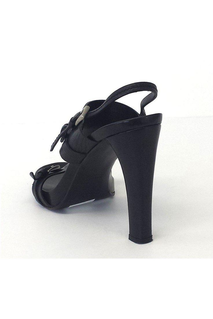 Size 8.5 EU 39.5 Black leather slingback sandals Silver tone buckles Made in Italy Adjustable ankle strap Leather soles Heel height 4.25" Black Open Toe Slingback Sandals With Strap, Formal Round Toe Slingback Pumps With Strap, Formal Slingback Pumps With Round Toe And Strap, Open Toe Slingback Pumps With Buckle Closure For Party, Elegant Black Slingback Sandals With Buckle, Elegant Black Slingback Sandals With Buckle Closure, Formal Slingback Heels With Tang Buckle, Leather High Heel T-strap Sandals With Buckle, Leather T-strap High Heel Sandals With Buckle