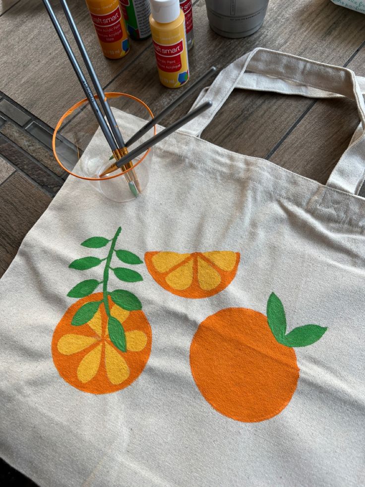 a bag with oranges painted on it