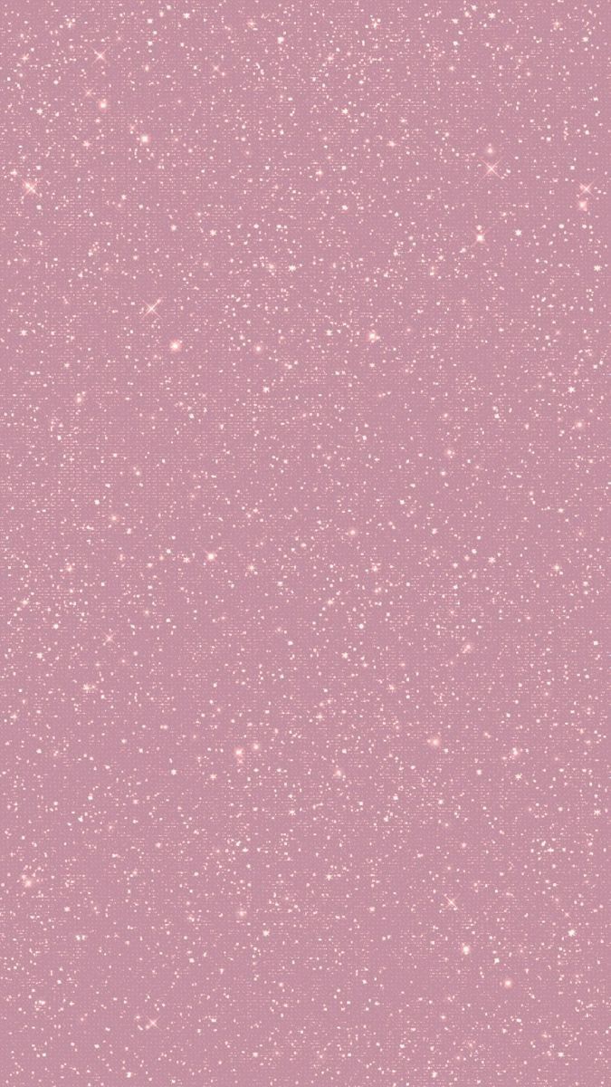 a pink background with white speckles on it