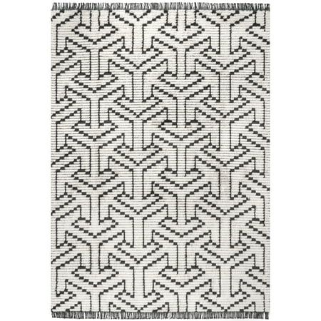 a black and white rug with fringes on the bottom, in an abstract pattern