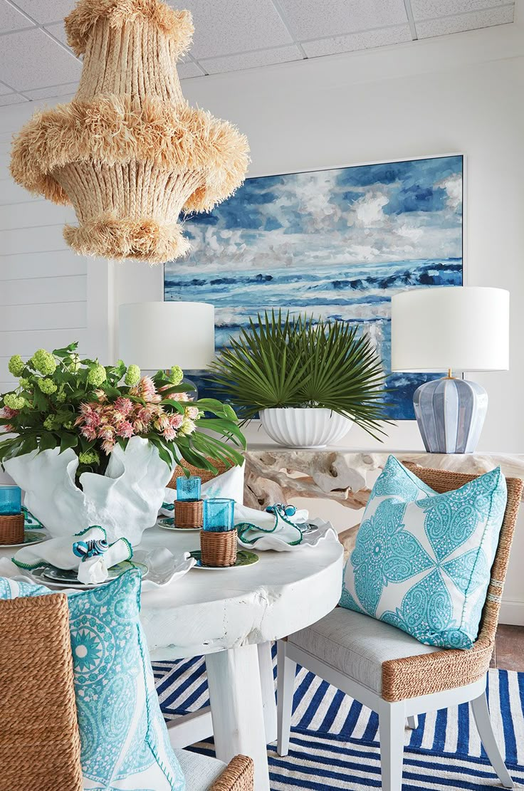 a dining room with blue and white decor