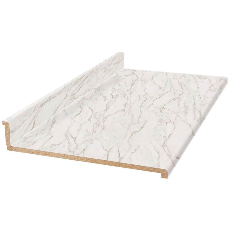 a white marble counter top with wooden edges