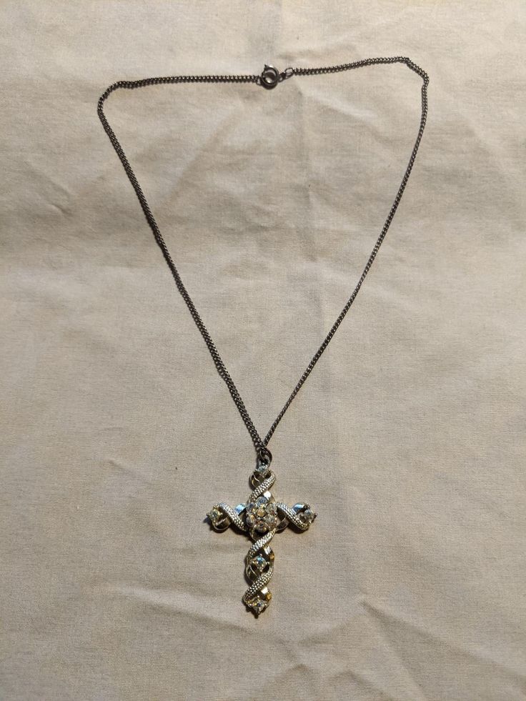 Vintage 1950's Cross w/ jewels and wrapping. Ostentatious enough to be Goth, sure to be noticed at church! 17" chain. Vintage Jewelry With Adjustable Chain For Party, Vintage Party Jewelry With Adjustable Chain, Vintage Jeweled Necklaces For Vintage Events, Vintage Necklace For Vintage Events, Antique Chain Necklace For Wedding, Vintage Metal Chain Necklace For Party, Vintage Chain Necklace With Adjustable Chain For Party, Vintage Chain Necklace For Party With Adjustable Chain, Vintage Adjustable Chain Necklace For Party