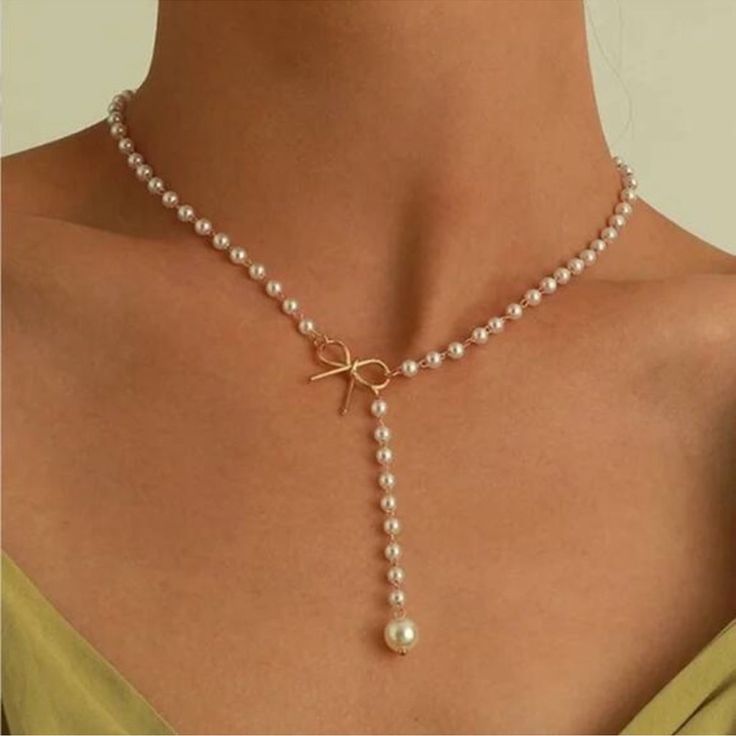 Questions? Leave A Comment Below! White Adjustable Lariat Necklace With Pearl Charm, Chic White Necklace With Clavicle Chain, Chic White Clavicle Chain Necklace, White Pearl Lariat Necklace With Clavicle Chain, Pearl Dangle Lariat Necklace, Summer Lariat Necklace With Adjustable Chain, Pearl Lariat Necklace With Clavicle Chain, Pearl White Lariat Necklace Gift, Pearl White Lariat Necklace As Gift