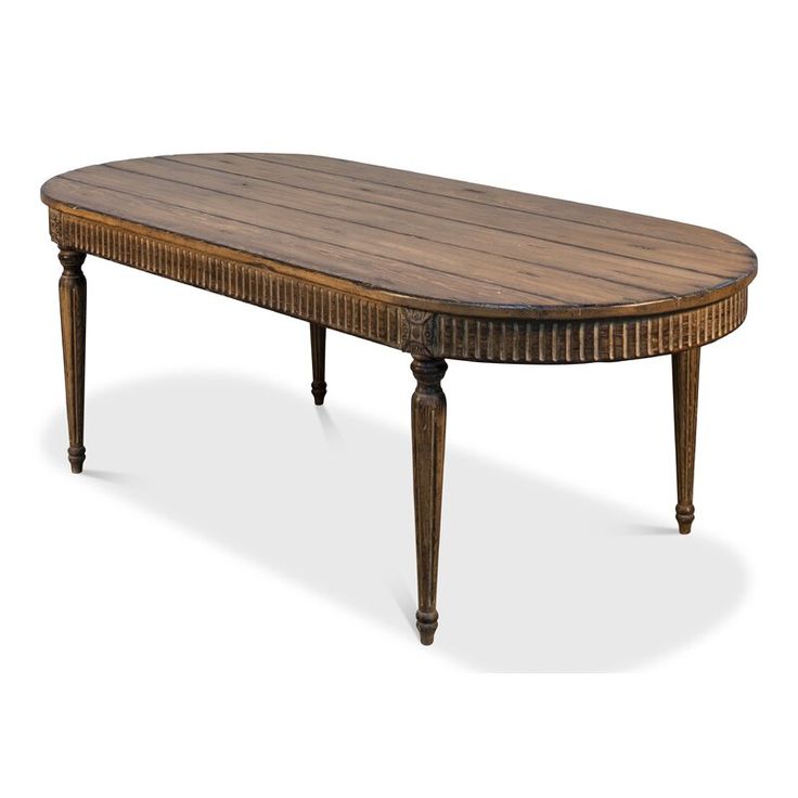 an oval wooden table with turned legs and carved wood top, viewed from the front