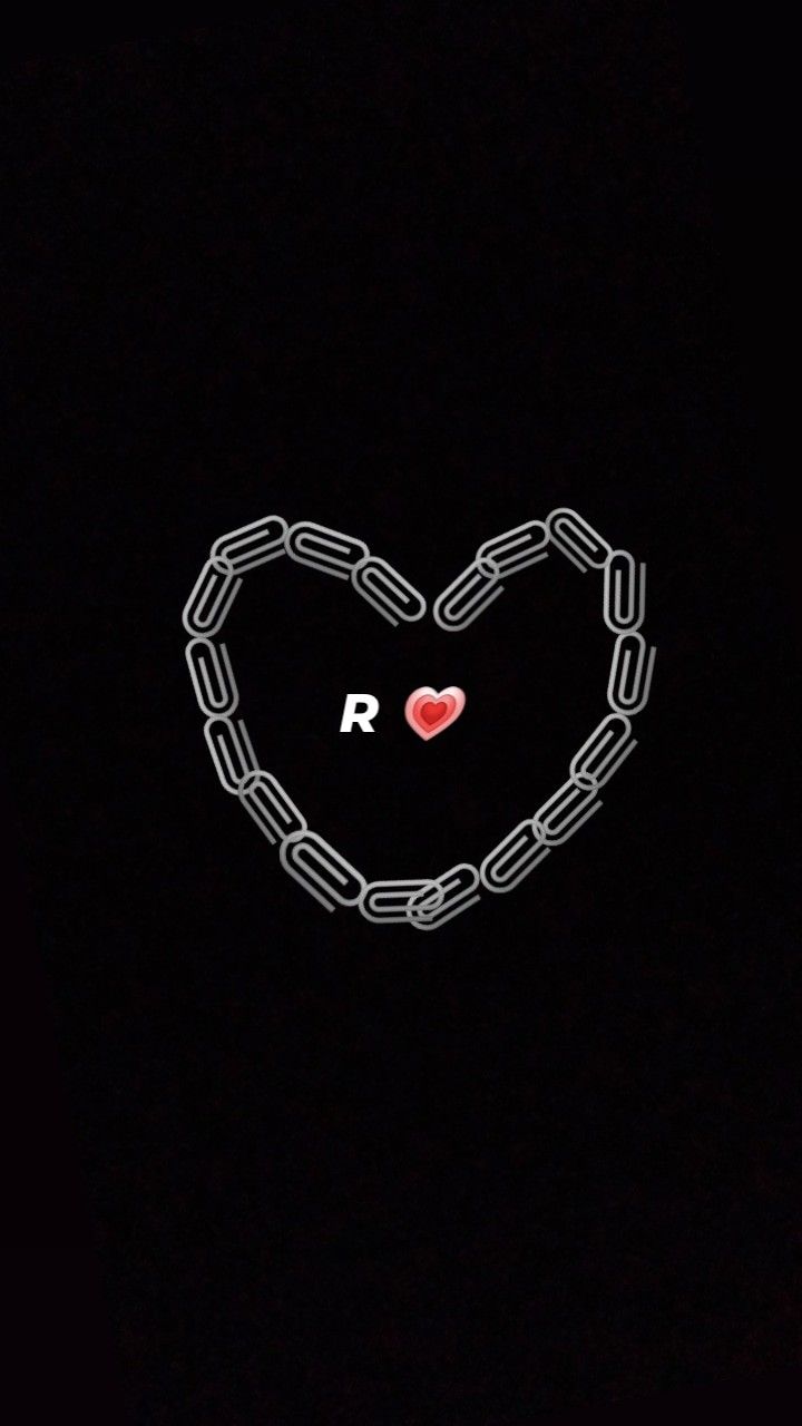 a heart with chains and a red heart in the middle