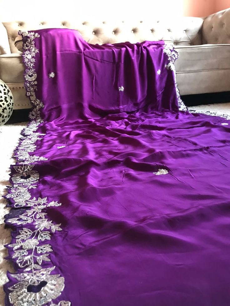 Purple Designer Premium Pure Crepe Silk drapes of silky soft smooth luxury embellished with pearl silver sequins cut daana handwork & contrast yellow heavy handwork bp  Prebooking 15 days approximately Silver Saree With Resham Embroidery For Eid, Elegant Purple Dupatta For Eid, Purple Dabka Work Dupatta For Party, Purple Embroidered Silk Saree, Purple Dupatta With Dabka Work For Party, Elegant Purple Dupatta For Festive Occasion, Elegant Purple Dupatta For Diwali, Silver Georgette Saree With Mirror Work, Elegant Purple Dupatta With Zari Work