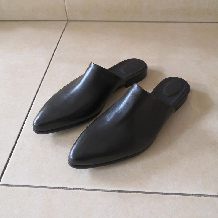 "Flat Leather Shoes Black Mules, Leather Mules, Women Shoes, Leather Sandals, Slip On, Black Pointed Mules, Women's Closed toe Sandals ------------------------------ We use the finest leather and the most comfortable shoe shape. We use a manufactured durable sole so that you can enjoy the most out of these gorgeous shoes. All of our shoes are handmade, created with careful attention to comfort, detail and style. ------------------------------ Sandals Details: * Color - Black * Upper Materials: L Black Closed Toe Sandals For Business, Black Leather Shoes With Pointed Toe And Removable Insole, Black Pointed Toe Business Sandals, Black Closed Toe Mules For Business, Black Pointed Toe Sandals For Business, Classic Black Flat Heel Sandals, Black Closed Toe Flats For Business, Black Closed Toe Mules With Leather Footbed, Leather Sandals With Pointed Toe And Slip-on Fit