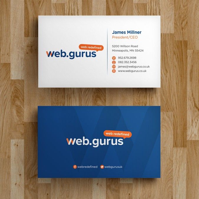 a business card with the word web gurus on it sitting on top of a wooden floor