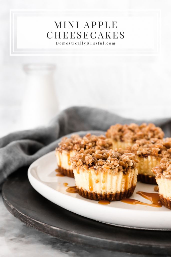 mini apple cheesecakes on a white plate with caramel drizzle topping