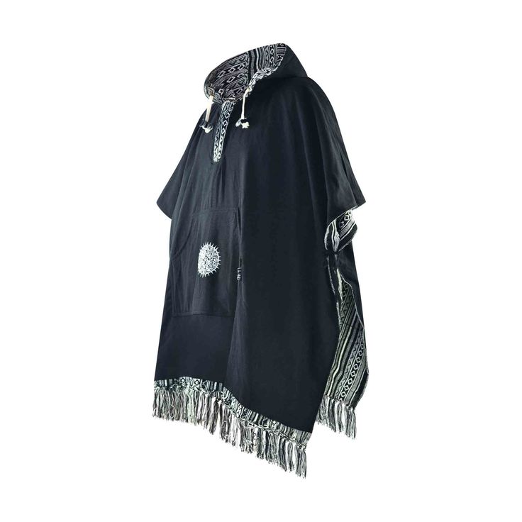 Reversible hooded poncho

Introducing the Arriba Black reversible poncho from virblatt, the perfect addition to any boho-inspired wardrobe. Featuring a striking black and white pattern on one side and solid black on the other, this versatile poncho is perfect for both men and women.

Designed with the bohemian aesthetic in mind, this poncho features mandala embroidery, fringes, and a hood, making it perfect for any boho outfit. The reversible design adds some much-needed versatility to your ward Traditional Black Shawl Outerwear, Traditional Black One-size Poncho, Black Bohemian Outerwear For Outdoor, Black Bohemian Poncho Shawl, Bohemian Hooded Cape For Outdoor, Black Shawl Outerwear For Festival, Black Hooded Poncho For Outdoor, Black Bohemian Cape For Festivals, Bohemian Black Cape For Festival