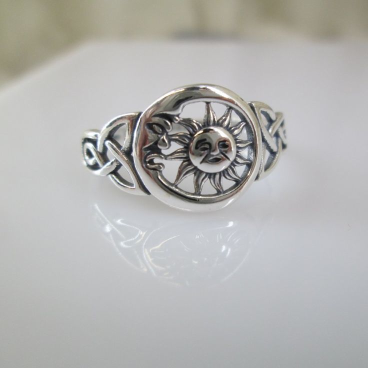 Celtic Moon And Sun Ring. Sterling Crescent Moon And Sun Ring. Beautifully Designed Crescent Moon And Sun Ring, Perfect For Women And Men. This One Has The Celtic Triquetras On The Sides, Really Nice Workmanship. Well Crafted And Durable. Face Height = 11mm. This Will Be Your New Go To Ring! Stamped 925. Sun Ring Silver, Sun And Moon Engagement Ring, Adjustable Ring With Sun And Moon Design, Adjustable Sun And Moon Design Rings, Adjustable Open Ring With Sun And Moon Design, Adjustable Sun And Moon Open Ring, Mystical Sterling Silver Crescent Ring, Mystical Crescent Rings With Sun And Moon Design, Mystical Crescent Sterling Silver Rings