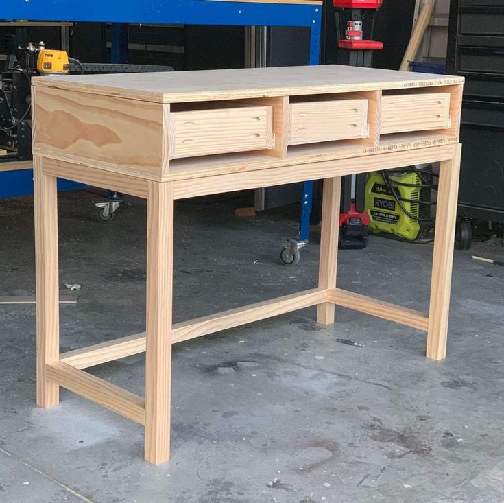 a workbench made out of plywood and wood