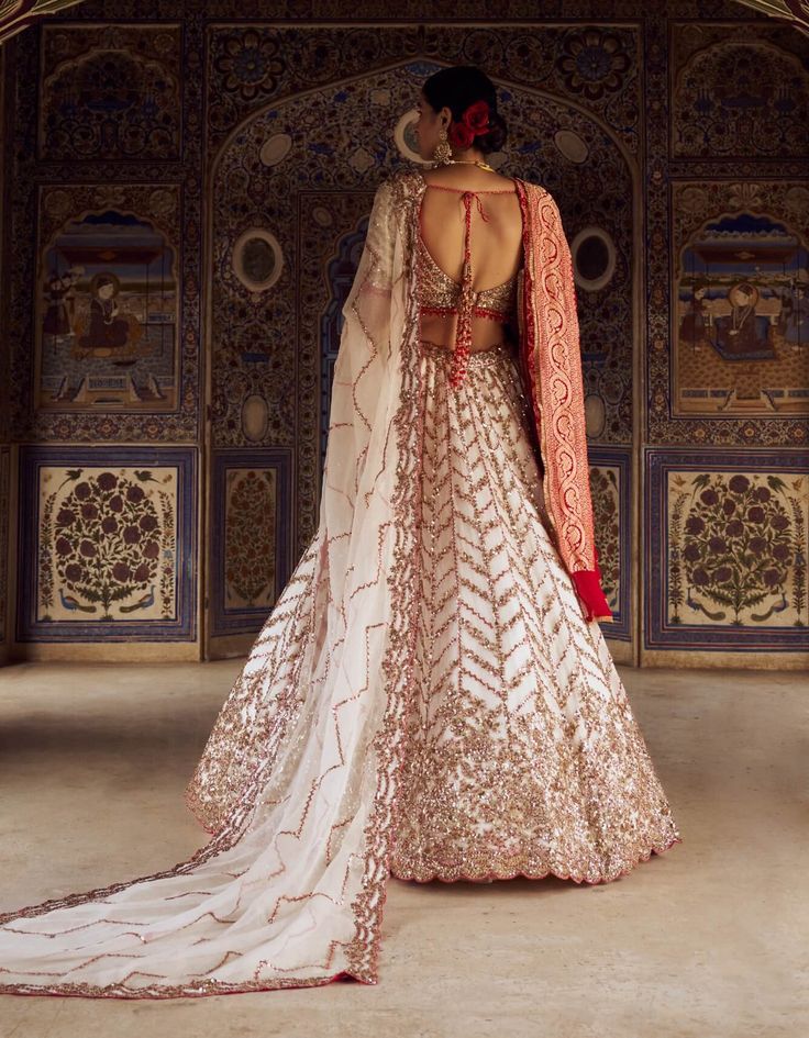 Embrace elegance in this ivory organza lehenga choli set, exquisitely embroidered with gold dabka, sequins, beadwork, and red resham French knots. It comes with a red bandhej second dupatta to add a vibrant touch. Organza Lehenga, French Knots, Lehenga Choli, Passion For Fashion, Western Fashion, Design Crafts, Indian Fashion, Occasion Wear, Lehenga