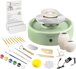 an electric food processor with all the tools needed to make it into a cake or cupcake