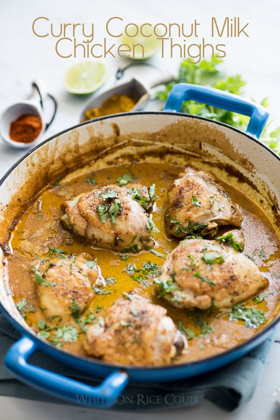 curry coconut milk chicken thighs in a skillet