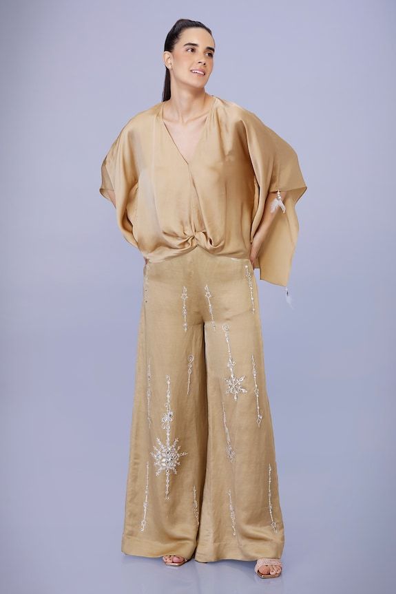 Light gold trouser with diamond, thread, sequin applique embroidery in snowflake pattern. - Aza Fashions Gold Silk Bottoms For Party, Elegant Embellished Gold Bottoms, Elegant Gold Embellished Bottoms, Elegant Gold Bottoms For Festive Occasions, Elegant Festive Gold Bottoms, Elegant Gold Wide-leg Pants, Gold Embellished Evening Bottoms, Chic Embellished Bottoms For Wedding, Chic Embellished Wedding Bottoms