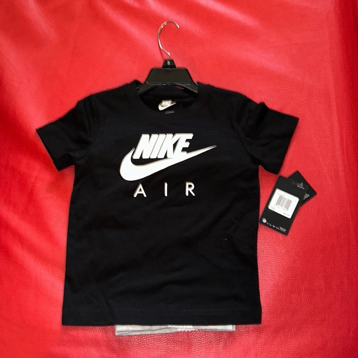 - Nike Boys' Air T-Shirt And Shorts Set - Size: 4, 5, And 6 - Color: Black And White Shirt, Bottoms Are Gray - Brand New - Smoke And Free Zone - Feel Free To Make Offers! Black Cotton Tops For Playwear, Black Short Sleeve T-shirt For Play, Black Short Sleeve T-shirt For Playwear, Black T-shirt With Graphic Print For Casual Wear, Nike Sporty T-shirt For Play, Black Crew Neck Tops For Playwear, Casual Black Playwear Tops, Black Casual Playwear Tops, Casual Black Tops For Playwear