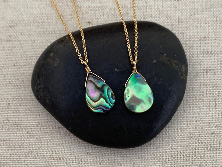 "Vibrant abalone shell pendants on a custom chain of your choice. Choose your favorite pendant, you will receive exact one pictured. Stone measures 14mm x 10mm. Choose your desired necklace length from the drop down menu. A 2-inch extender chain can be added upon request. This extender chain is 2\" of a larger link that allows you to adjust where the necklace lays depending on what you're wearing. Great option if you're buying a gift!" Pendant Shell Necklace With Lobster Clasp As Gift, Shell Shaped Wire Wrapped Jewelry Gift, Wire Wrapped Shell Jewelry As Gift, Wire Wrapped Shell Jewelry For Gift, Gift Shell Necklace With Lobster Clasp, Bohemian Shell Charm Necklace As Gift, Unique Shell Pendant Necklace As Gift, Unique Shell Pendant Necklace For Gift, Unique Pendant Shell Necklace As Gift