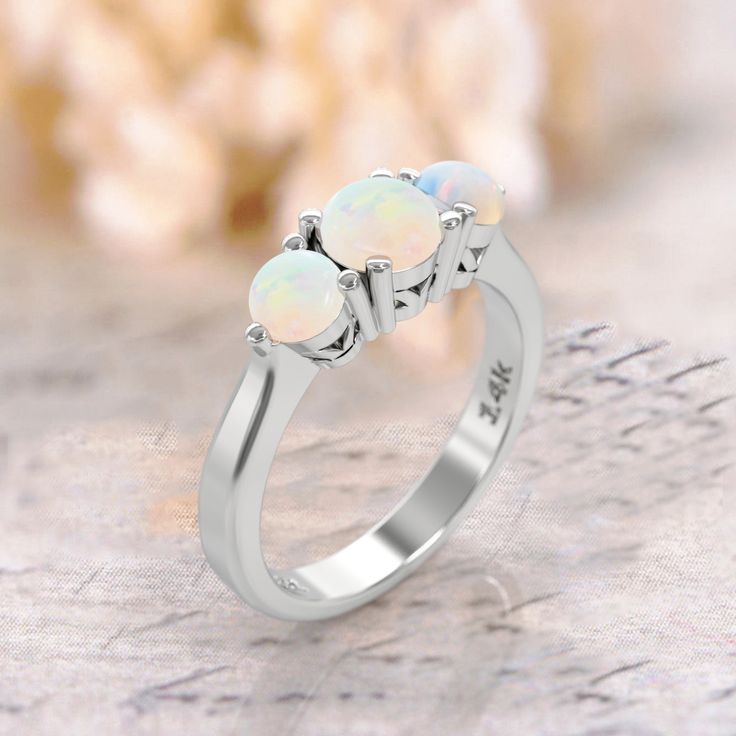 three opalite stone ring in white gold