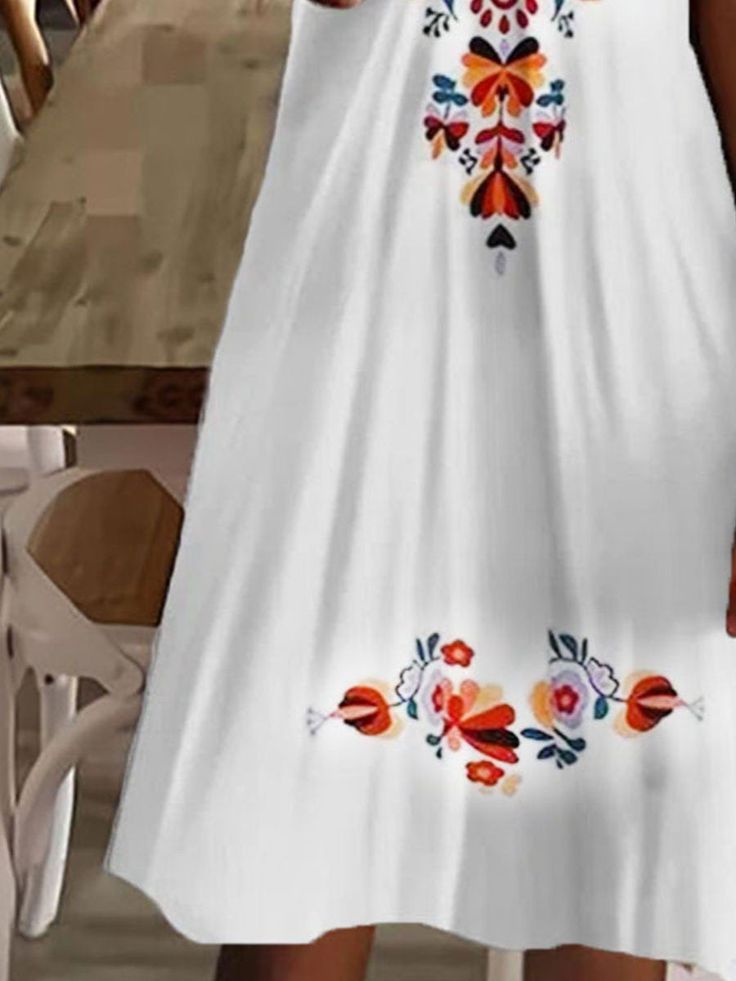 Women's Casual Floral Printed Mini Dress White Printed V-neck Sundress, White A-line Printed Sundress, Summer Floral Embroidered A-line Maxi Dress, White V-neck Printed Sundress, Summer Floral Embroidered Knee-length Dress, White Printed Sleeveless Sundress, White Bohemian Sleeveless Dress With Floral Print, White Printed Maxi Length Sundress, White Flowy Printed Mini Dress