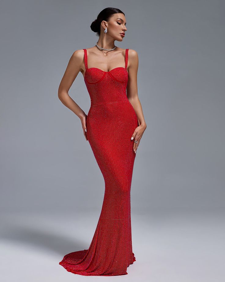 Make a statement at any event with our Rivet-Embellished Mermaid Evening Dress. Featuring intricate rivet detailing, this dress will elevate your style and make you stand out from the crowd. Look and feel confident and glamorous in this stunning piece. Perfect for formal occasions, weddings, and more. Our Style No.KLYF1063 85% Polyester, 15% Elastane Height - 68.9"/175cm Bust - 34.6"/88cm Waist - 25.6"/65cm Hips - 36.6"/93cm and wears size M About Wholesale/Dropshipping, please contact us! Note: Fitted Red Mermaid Dress For Party Season, Party Mermaid Dress With Rhinestones And Fitted Bodice, Red Carpet Fitted Evening Dress With Sequins, Fitted Sequin Evening Dress For Red Carpet, Red Mermaid Hem Dress For Party Season, Gala Evening Dress With Rhinestones And Mermaid Hem, Mermaid Hem Evening Dress With Rhinestones For Gala, Mermaid Hem Gala Dress With Rhinestones, Fitted Maxi Evening Dress With Rhinestones