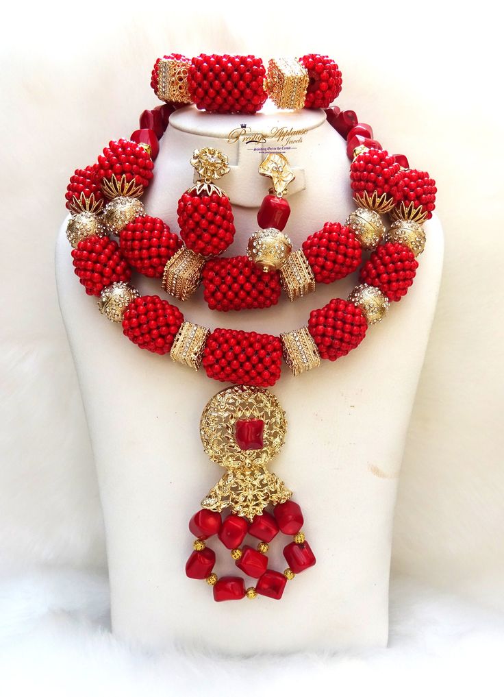 Elongated Beautiful Mixed Traditional Red Coral Style Beads Necklace African Nigerian Set Complete Set is Necklace Earring and bracelet. Comes with two styles earring. Beautifully designed by PrestigeApplause Wedding Party Bridal Special Occasion This detailed Jewellery set makes you stand out elegantly in any special occassion, it's all about glamour and uniqueness.  Buying more that 2 Jewellery set, we offer wholesale and bulk prices for all our jewellery. Elegant Red Coral Beaded Bracelets With Round Beads, Elegant Red Coral Round Bead Jewelry, Elegant Red Coral Beaded Bracelets, Traditional Red Coral Round Bead Jewelry, Elegant Red Coral Beads For Jewelry Making, Red Coral Round Beads For Jewelry Making, Red Coral Jewelry For Wedding, Red Coral Wedding Jewelry In Red, Elegant Red Beaded Jewelry