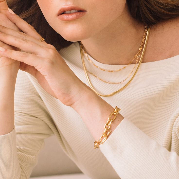 Feel beautiful wearing our Monroe Toggle Bracelet, crafted from a luxe link chain with an easy toggle closure. Dare to stand out wearing the perfect balance of contemporary and classic style in gold. Make the Monroe Toggle Bracelet your signature accessory and be surprised by the endless compliments you receive. Dare to shine with Monroe. Available in 14k gold plated brass 7" link chain 1/2" toggle closure SKU: BYB1171 Toggle Bracelet, Feel Beautiful, The Endless, How To Feel Beautiful, Link Chain, Gold Vermeil, Gold Metal, Unique Style, Classic Style