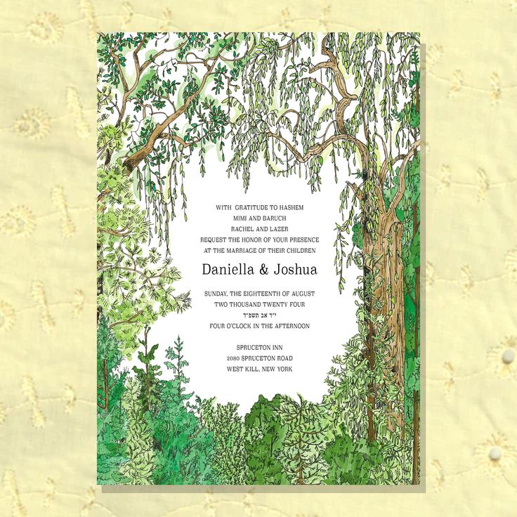 a wedding card with an image of trees and leaves on it, in the middle of a