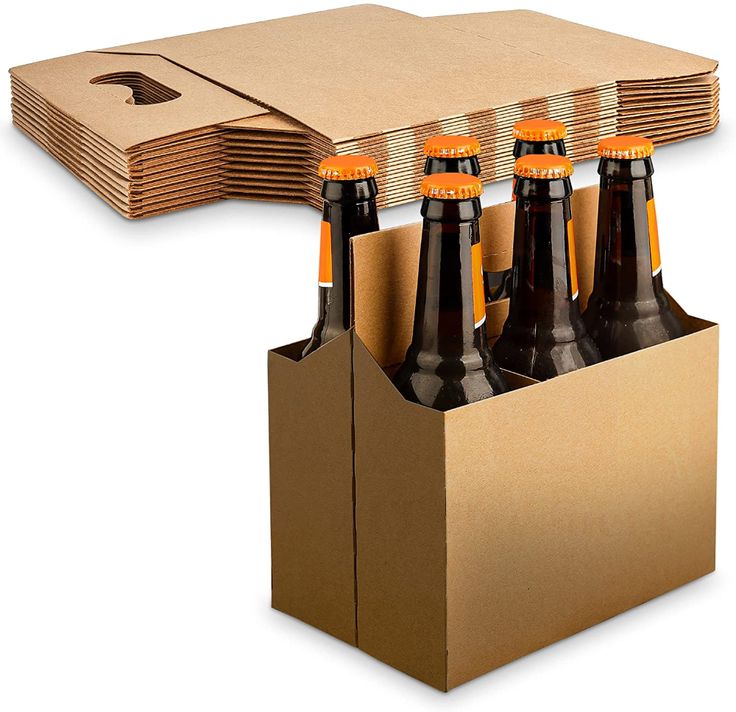 six beer bottles are in a cardboard box