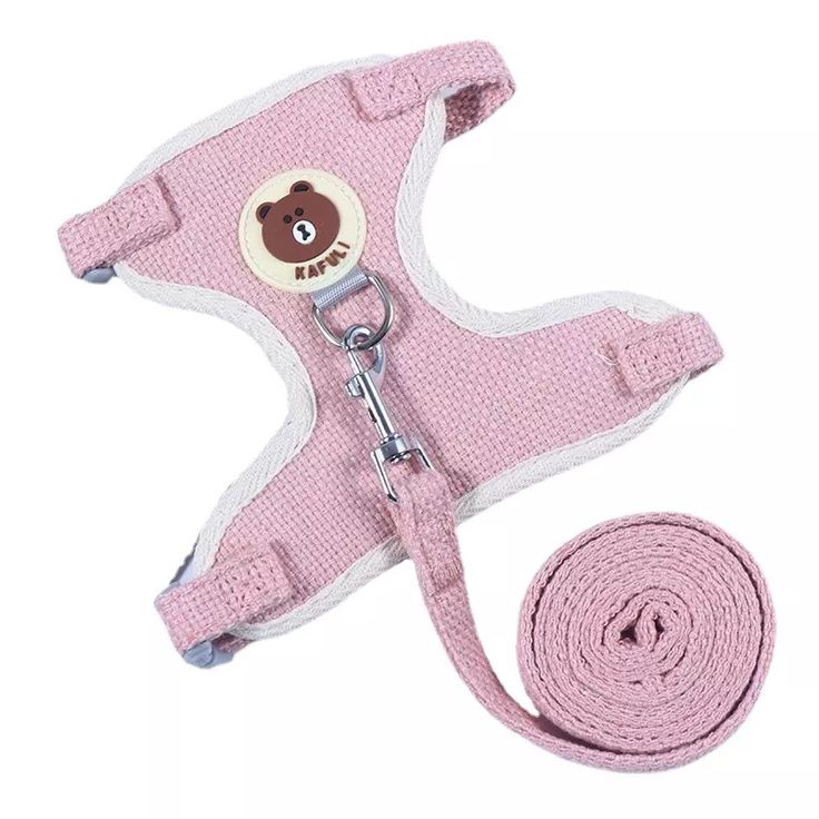 a pink leash with a teddy bear on it