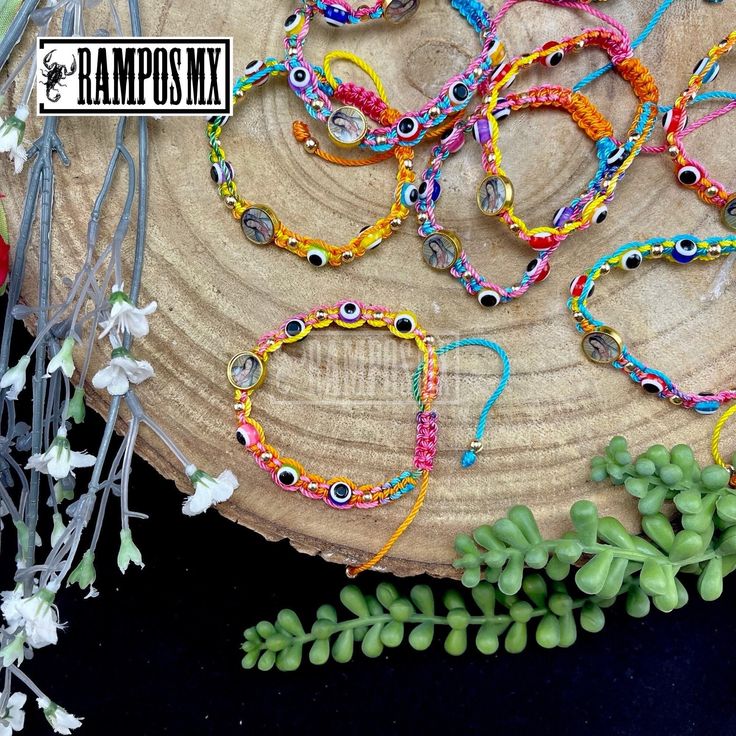 "Beautiful Mexican Handmade Woven \" Our Lady of Guadalupe \" and \"Evil eye\" Unisex bracelet \"Virgen de Guadalupe\" with the company of San Benito Symbol is Handmade braided Design by our Artisan Team to create a beautiful Stylish ,protection and positive accessory , definitely a must have in your religious Catholic Bracelet Collection :) ( One bracelet per order) Color can change slightly depending on the device screen thats been viewed on. Bracelet has and adjustable : One size Fits All Uni Beach Festival Bracelet Jewelry, Adjustable Beaded Bracelets For Beach Festivals, Adjustable Beaded Bracelet For Beach Festivals, Spiritual Resizable Bracelet For Festivals, Multicolor Beaded Bracelets As Gift, Adjustable Bangle Beaded Bracelets For Festivals, Spiritual Multicolor Resizable Beaded Bracelets, Multicolor Evil Eye Round Bracelets, Multicolor Round Evil Eye Bracelets