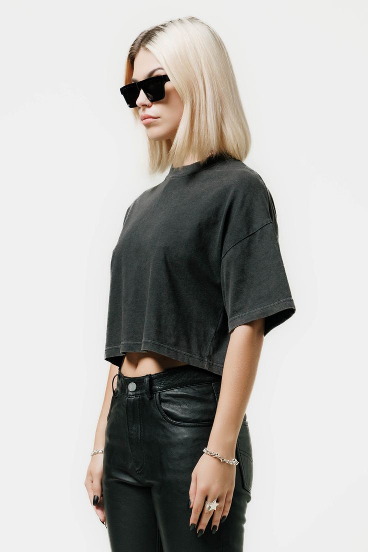 A Cropped Oversized T-Shirt with Ribbed Neck. Crafted From 100% 240Gsm Organic Cotton. 

Finished With A Vintage Wash Giving It An Authentic Worn Out Look And Feel. Black Boxy Cropped T-shirt With Crew Neck, Urban Oversized Washed Black Top, Urban Everyday Washed Black Tops, Boxy Short Sleeve T-shirt For Fall, Boxy Short Sleeve T-shirt, Washed Black Urban Tops For Everyday, Urban Style Washed Black Tops For Everyday, Black Loose Fit Cropped Cotton T-shirt, Black Boxy Cropped Cotton T-shirt