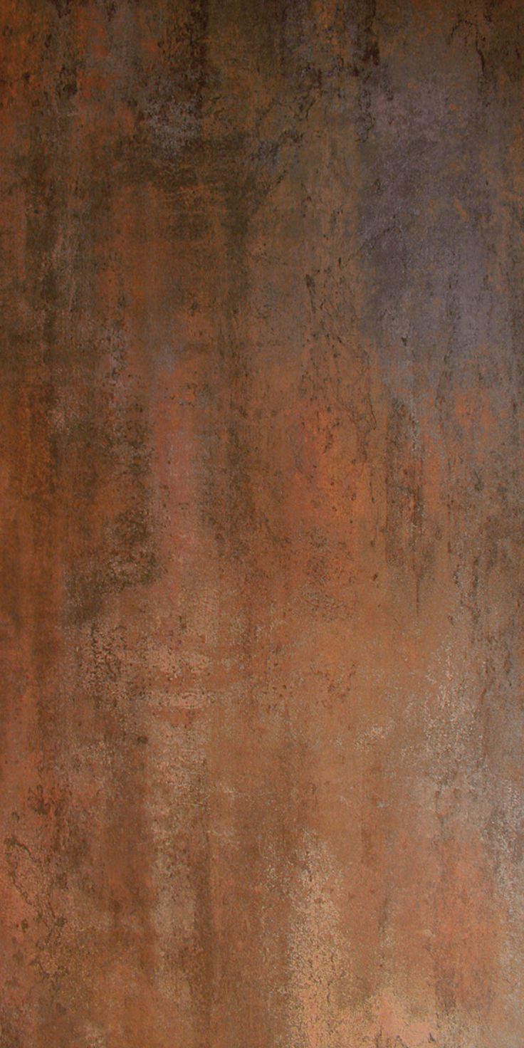 an old rusted metal surface is shown in this image