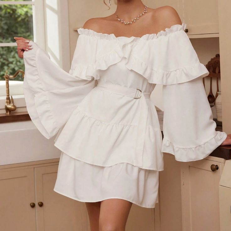 Off Shoulder Belted High Waisted Ruffle Tiered Layered Non Stretch 100% Polyester Shop Our Full Collection Of: Romantic Date Night Bride Lingerie Winter Fall Summer Spring Boho Gypsy Hippie Beachy Birthday Gift Resort Bohemian Girly Trendy Minimalist Y2k College 90s 00s Vintage Wedding Guest Engagement Party Bachelorette Vacation Cruise Travel Western Aesthetic Vibe Retro Christmas Thanksgiving Holiday Chic Casual Dressy Preppy Tiktok Classic Classy Work Office Business Contemporary Professional White Off-shoulder Ruffled Dress, White Off-shoulder Dress With Ruffles, White Ruffled Skirt Dress For Daywear, White Belted Dress For Garden Party, Fitted Belted Tiered Dresses, White Feminine Tiered Ruffle Dress, White Feminine Tiered Skirt Ruffle Dress, White Feminine Ruffle Dress With Tiered Skirt, White Long Sleeve Dress With Ruffled Skirt