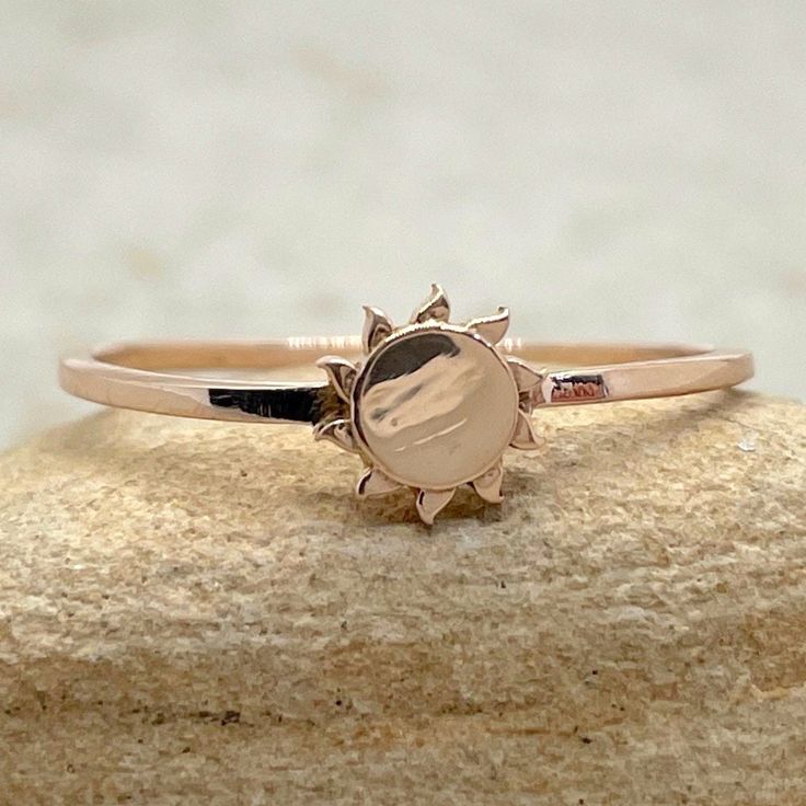 This Sun Charm Ring is part of our Celeste Collection. Wear it alone, or stack it with the other charm rings in this collection. We are a Truly Handmade, Family/Woman owned business. My husband and I hand-make each item once ordered.  You can find answers to all your questions about our Lifetime Care Plan, Insured Shipping, etc. by copying and pasting this link into your browser: https://lauriesarahdesigns.com/help-center-faqs/?v=7516fd43adaa  Thank you for supporting handmade!  Laurie Sarah and Adjustable Rose Gold Jewelry For Promise Ring, Adjustable Rose Gold Promise Ring, Adjustable Round Celestial Jewelry, Adjustable Tarnish Resistant Round Band Jewelry, Spiritual Rose Gold Ring Jewelry, Spiritual Style Rose Gold Ring, Adjustable Celestial Jewelry With Sun Design, Dainty Adjustable Rose Gold Stackable Rings, Sterling Silver Spiritual Rings In Rose Gold