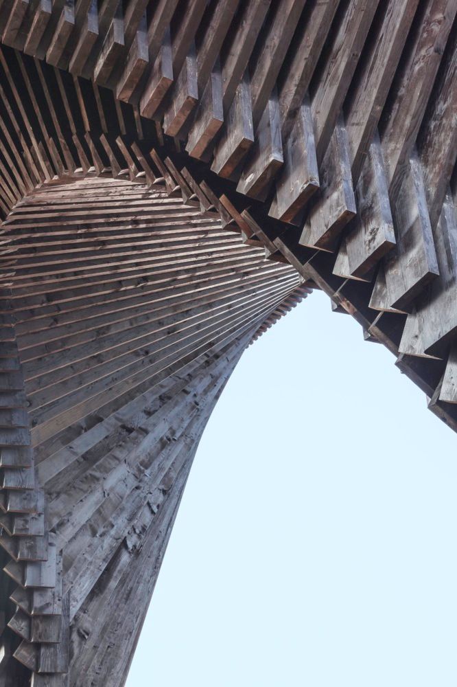 an image of a very tall structure that looks like it is made out of wood