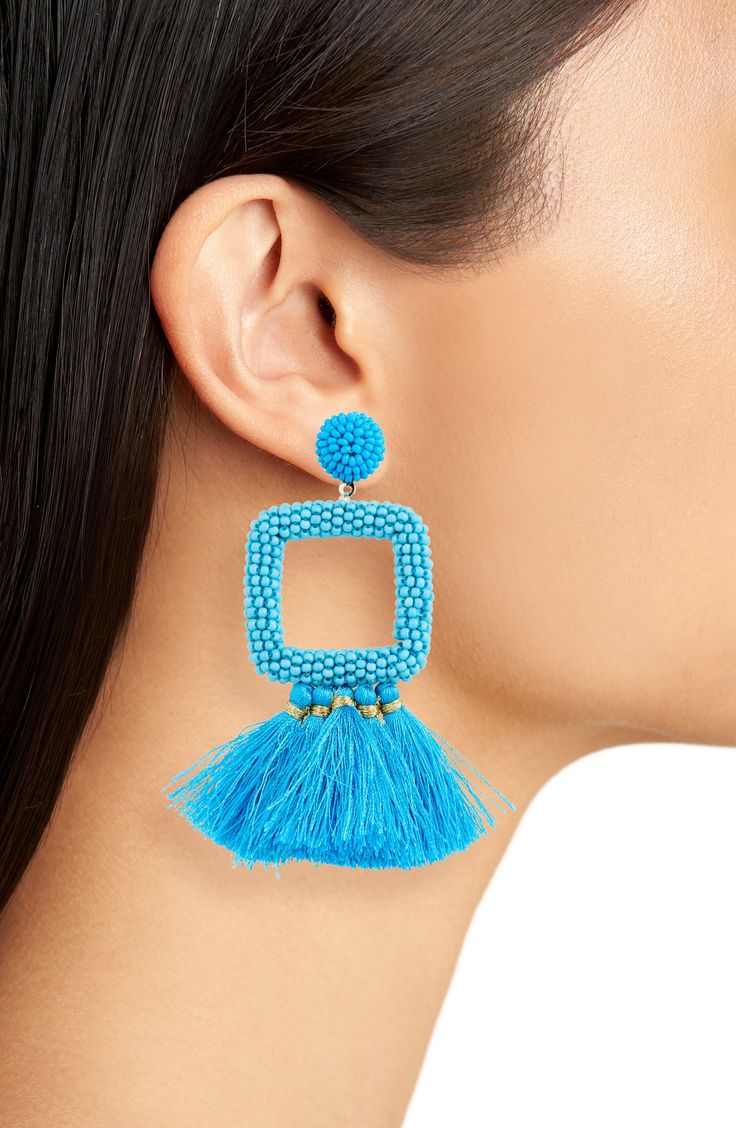 Tassel-trimmed drop earrings are wrapped with colorful beads to liven up your resort-ready look. Post back Thread/acrylic Imported Fringe Earrings For Vacation, Summer Blue Beaded Earrings With Tassels, Blue Beaded Fringe Tassel Earrings For Summer, Turquoise Fringe Beaded Earrings For Beach, Blue Tassel Drop Earrings For Beach, Turquoise Tassel Earrings For Summer, Turquoise Tassel Earrings For Beach, Beach Earrings With Latkans, Tassel Jewelry For Vacation