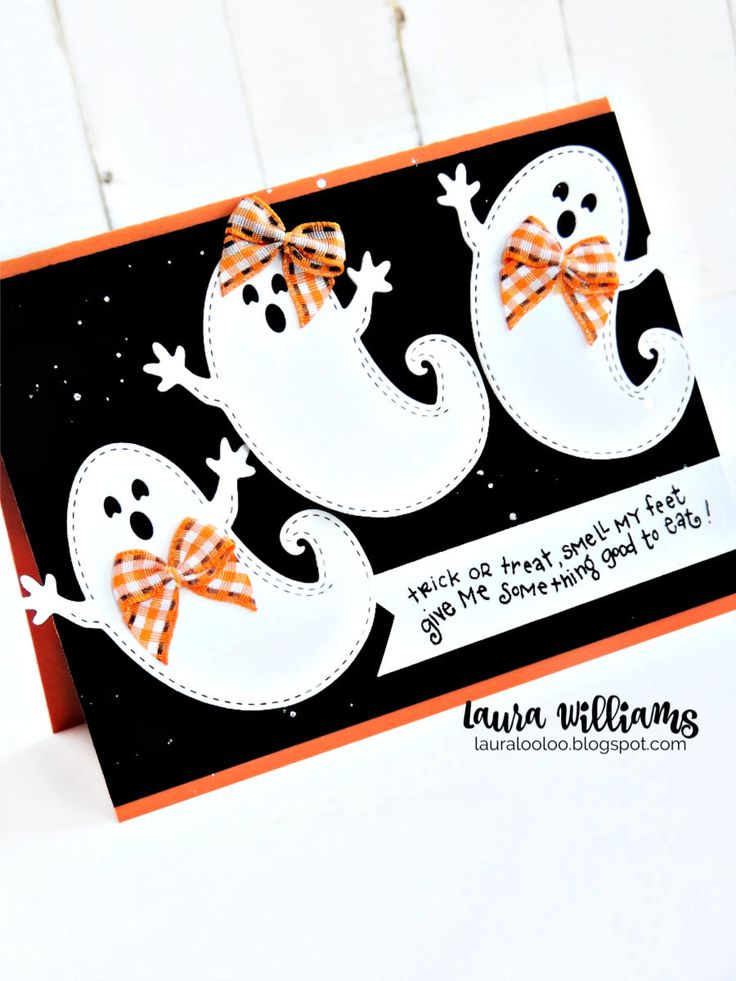 a close up of a card with two snowmen