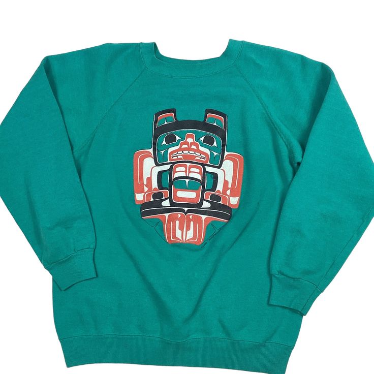 Vintage 80s Northwest Earth Crewneck sweatshirt. Made in the USA. 1986. Large front graphic. Tagged as a medium, measures as an XS/S. 19 inches pit to pit, 24 inches long. No rips or tears. Smoke and pet free home. Winter Vintage Graphic Print Sweatshirt, 90s Style Crew Neck Sweatshirt With Screen Print, Vintage Graphic Print Winter Sweatshirt, Vintage Winter Graphic Print Sweatshirt, 90s Crew Neck Sweatshirt With Screen Print, Retro Crew Neck Sweatshirt With Screen Print, Retro Crew Sweatshirt With Screen Print, Retro Cotton Sweatshirt With Screen Print, Vintage Graphic Tops For Fall