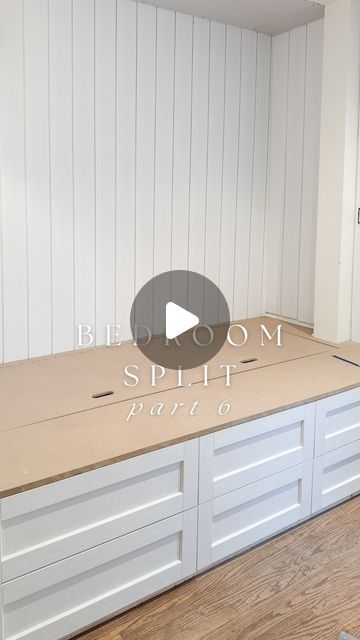 an empty kitchen with white cabinets and wood flooring in the background is a video about how to install cabinet doors