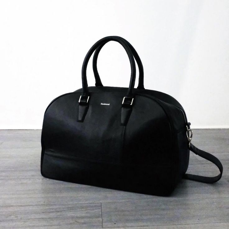 100% Genuine Leather No Tag Classic Black Textured Leather Travel Bag, Black Leather-lined Satchel Weekender Bag, Black Soft Leather Satchel Weekender Bag, Timeless Black Textured Leather Bags, Timeless Textured Black Leather Bags, Classic Black Textured Leather Duffle Bag, Classic Black Soft Leather Travel Bag, Elegant Textured Leather Duffle Bag For Daily Use, Timeless Black Textured Leather Satchel