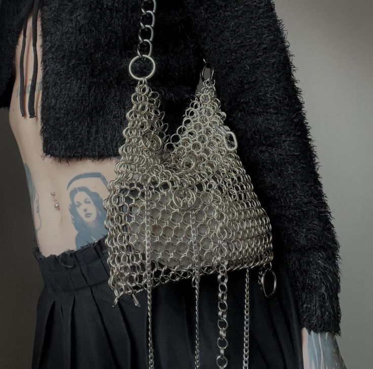 Handmade chainmail bag is made from silver tone steel. Chain is silver-black. High about 20cm. Width about 27cm. Allow up to 7 days for production plus shipping time. Chain Mail Accessories, Chain Maille Clothing, Silver Chainmail Bag For Everyday Use, Silver Metal Bag With Chain Strap, Chain Mail Outfit, Silver Metal Chain Link Bag, Silver Metal Chainmail Bag, Silver Chain Link Bag For Everyday Use, Silver Chainmail Evening Bag