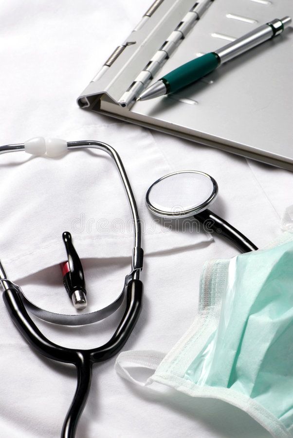 a stethoscope and medical supplies on a bed