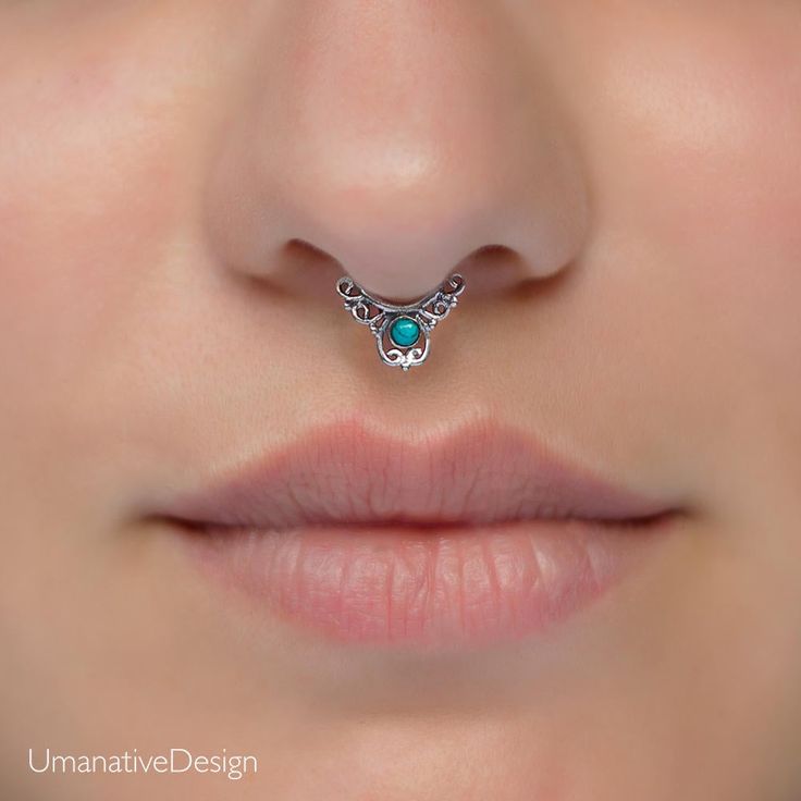 Unique and beautiful septum ring for non pierced nose. Tribal, ethnic, delicate design Material: You can choose the material : Gold plated brass / Sterling Silver / Brass Measures: Thickness: 1 mm - 18 gauge Width - 11 mm - 0.43Inch Length - 12.5 mm - 0.5Inch Diameter:0.23 Inch - 6mm ( The size can be adjusted according to your nose because it's a clip-on) *Nickel-free *Also available in a version for pierced nose. > How to clean brass and silver? Brass and silver oxidize naturally with time Bohemian Nose Rings For Festivals, Adjustable Nickel-free Septum Ring, Adjustable Internally Threaded Septum Ring, Handmade Bohemian Nose Rings, Handmade Bohemian Round Nose Rings, Handmade Bohemian Round Septum Ring, Bohemian Handmade Round Septum Ring, Nickel-free Bohemian Septum Ring, Adjustable Round Bohemian Nose Rings