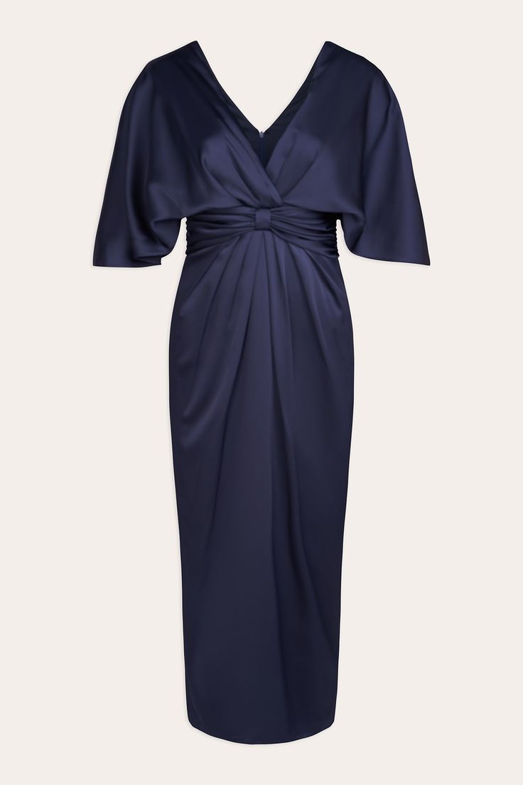 a women's blue dress with an asymmetrical knot on the front