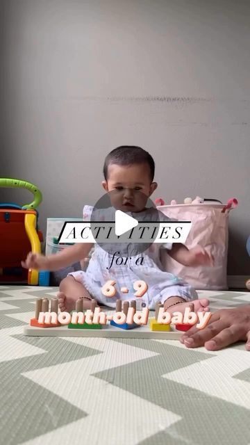 a little boy sitting on the floor with his hands in front of him that says happy birthday