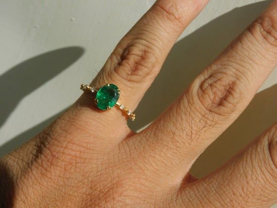 Mini Oval Emerald And Diamond Statement Ring In Gold / Anniversary Gift Ring / New Year Gift Ring / Best Gift For May Birthstone Lover / Surprised Your Love With This Beautifull May Birthstone Mini Emerald Ring  .....................-----------------------------------------------------------------------Item description - stone - natural emeraldshape - ovalsize - 5 mm width and 7 mm lengthweight - 1.10 caratscolour - rich green lustermaterial - 14k solid gold ( custom colour - white / rose / yell Emerald Ring Oval, Fine Jewelry Oval Cabochon Diamond Ring Gift, Oval Emerald Ring Fine Jewelry Gift, Oval Emerald Ring With Accent Stones For Gift, Emerald Oval Engagement Ring, Emerald Engagement Ring Oval, Oval Emerald Engagement Ring, Emerald Ring Design, Oval Emerald Ring